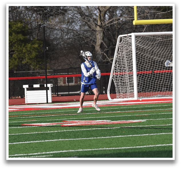 A soccer player in blue and white uniform is running towards the goal, trying to score. AI generated content