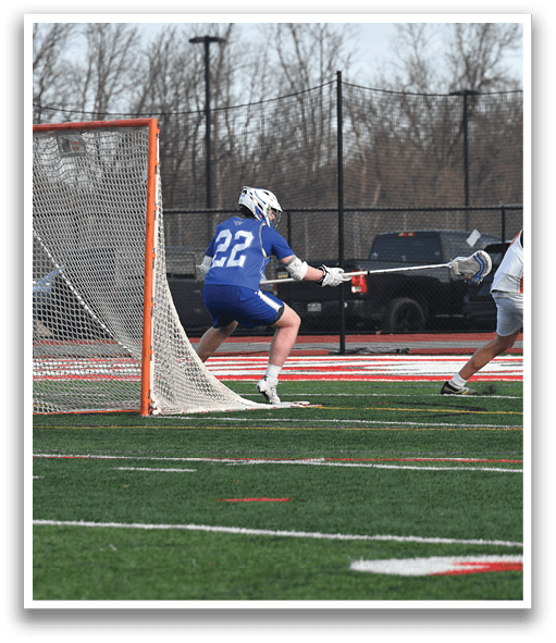 A group of men playing a game of lacrosse on a field. AI generated content