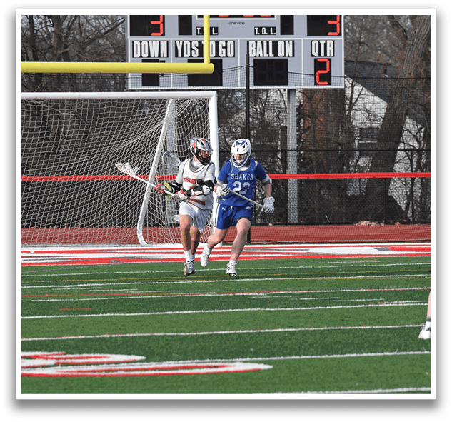 Three people playing a game of lacrosse on a field. AI generated content