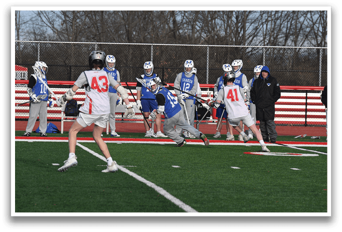 A group of people playing a game of lacrosse on a field. AI generated content