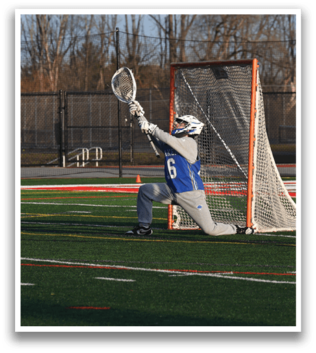 A man in a blue and white uniform is attempting to catch a ball. AI generated content