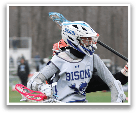 Two people playing lacrosse on a field. One person is holding a stick and the other is running. AI generated content