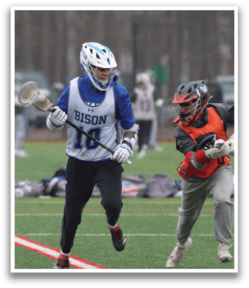 Two young men playing lacrosse on a field. One man is running with a lacrosse stick, while the other man is running with a lacrosse stick and a glove. AI generated content