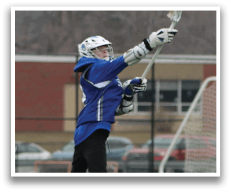 A man in a blue and white uniform is holding a lacrosse stick in the air. AI generated content