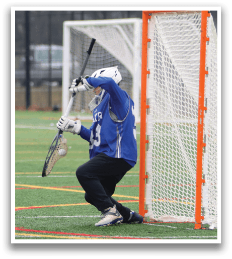 A person is crouching in front of a net, holding a baseball bat. AI generated content