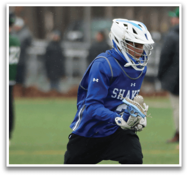 A person wearing a blue and white uniform is running on a field. AI generated content