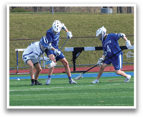 Three people playing a game of lacrosse on a field. AI generated content