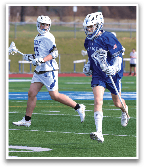 Two lacrosse players running on a field. AI generated content