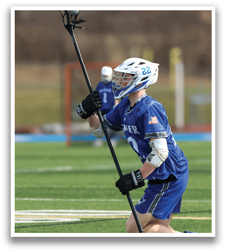 A man in a blue and white uniform is holding a lacrosse stick and running on a field. AI generated content