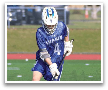 A person wearing a blue and white uniform is playing a game of lacrosse. AI generated content