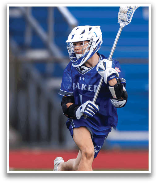 A lacrosse player in a blue uniform is running with a stick in his hand. AI generated content