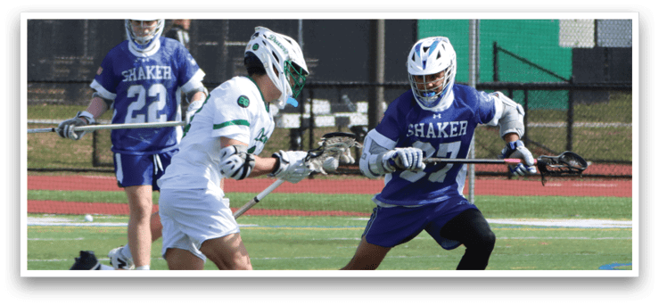 Two men playing lacrosse on a field. One man is running with a stick in his hand. AI generated content