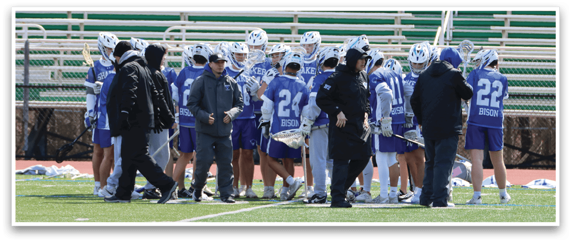 A group of people wearing blue and white uniforms are standing on a field. AI generated content