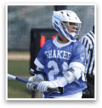 A man wearing a blue and white jersey is holding a lacrosse stick. AI generated content