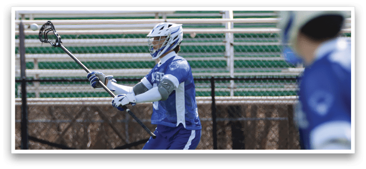 A man in a blue and white uniform is holding a lacrosse stick and preparing to shoot the ball. AI generated content
