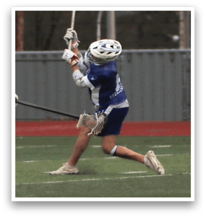 A man wearing a blue and white uniform is holding a lacrosse stick and preparing to shoot the ball. AI generated content