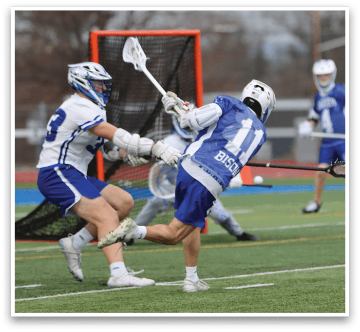 A group of people playing lacrosse on a field. AI generated content
