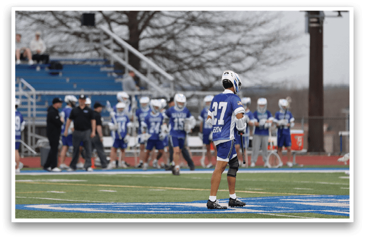 A group of people are standing on a field, some of them wearing helmets. AI generated content
