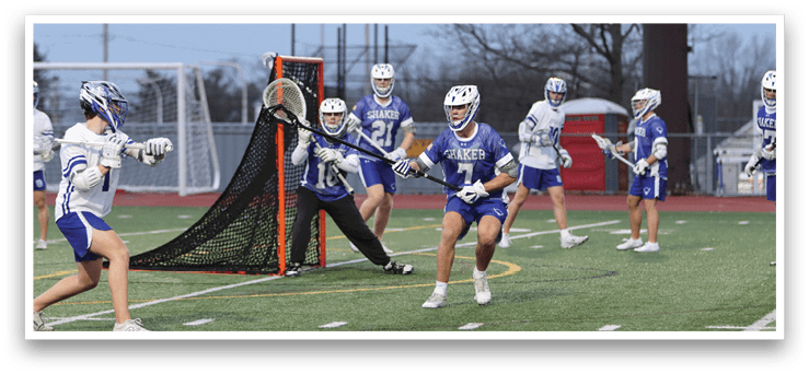 A group of people playing a game of lacrosse on a field. AI generated content
