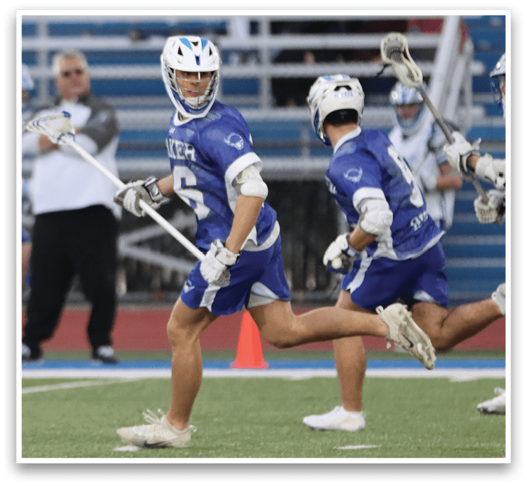 A group of lacrosse players running on a field. AI generated content
