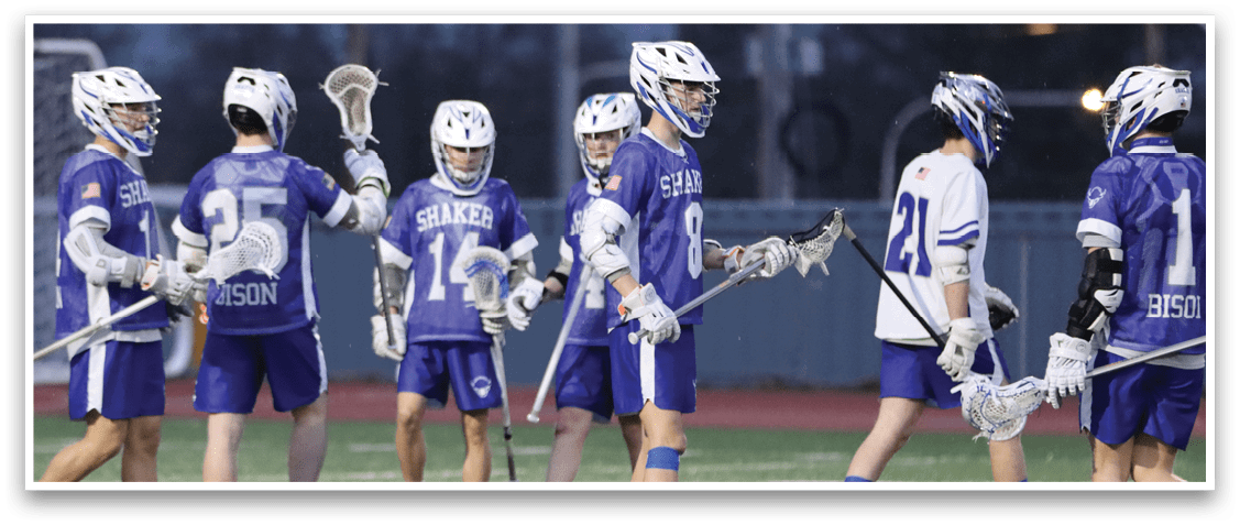 A group of lacrosse players walking on a field. AI generated content