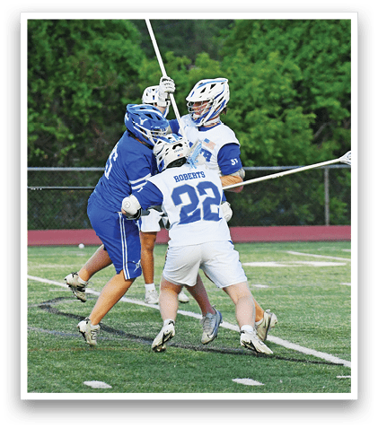 A group of people playing a game of lacrosse. Description generated by AI