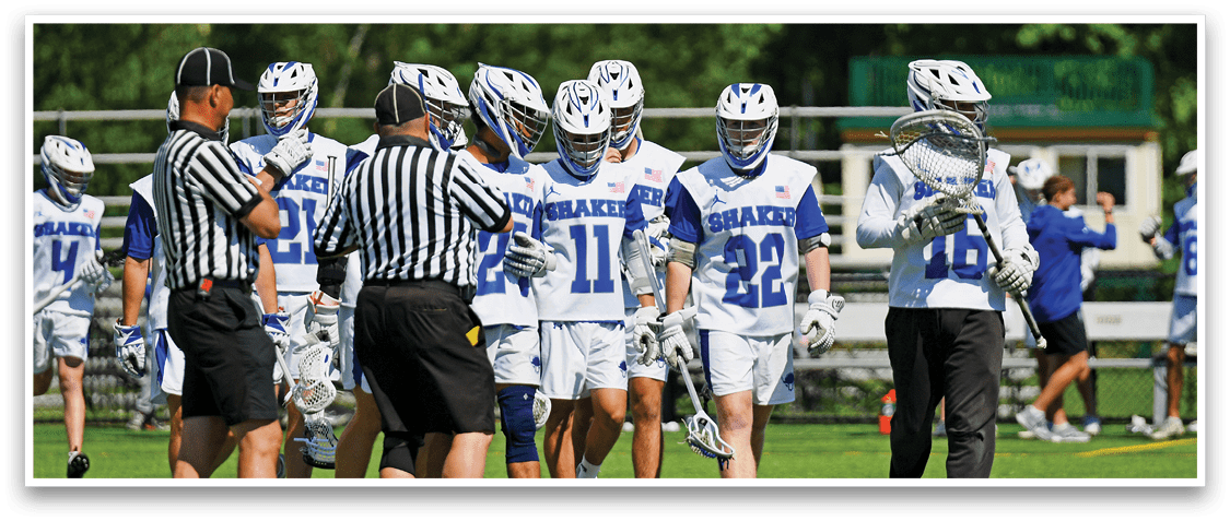 A group of people wearing white and blue uniforms. Description generated by AI