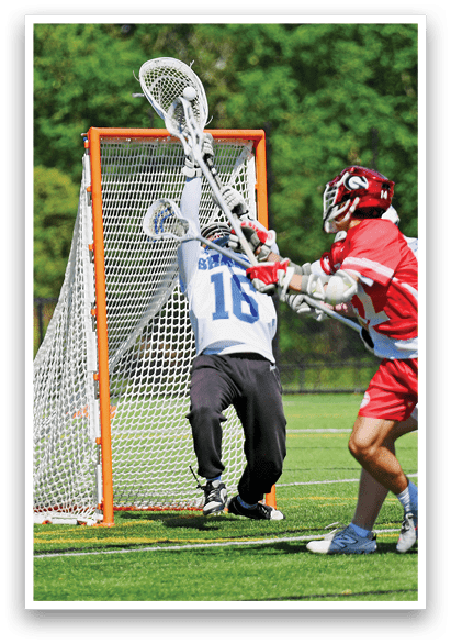 A man in a red and white uniform is trying to score a goal. Description generated by AI