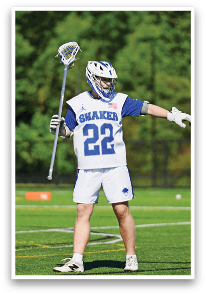 A man wearing a blue and white uniform with the number 22 on it. Description generated by AI