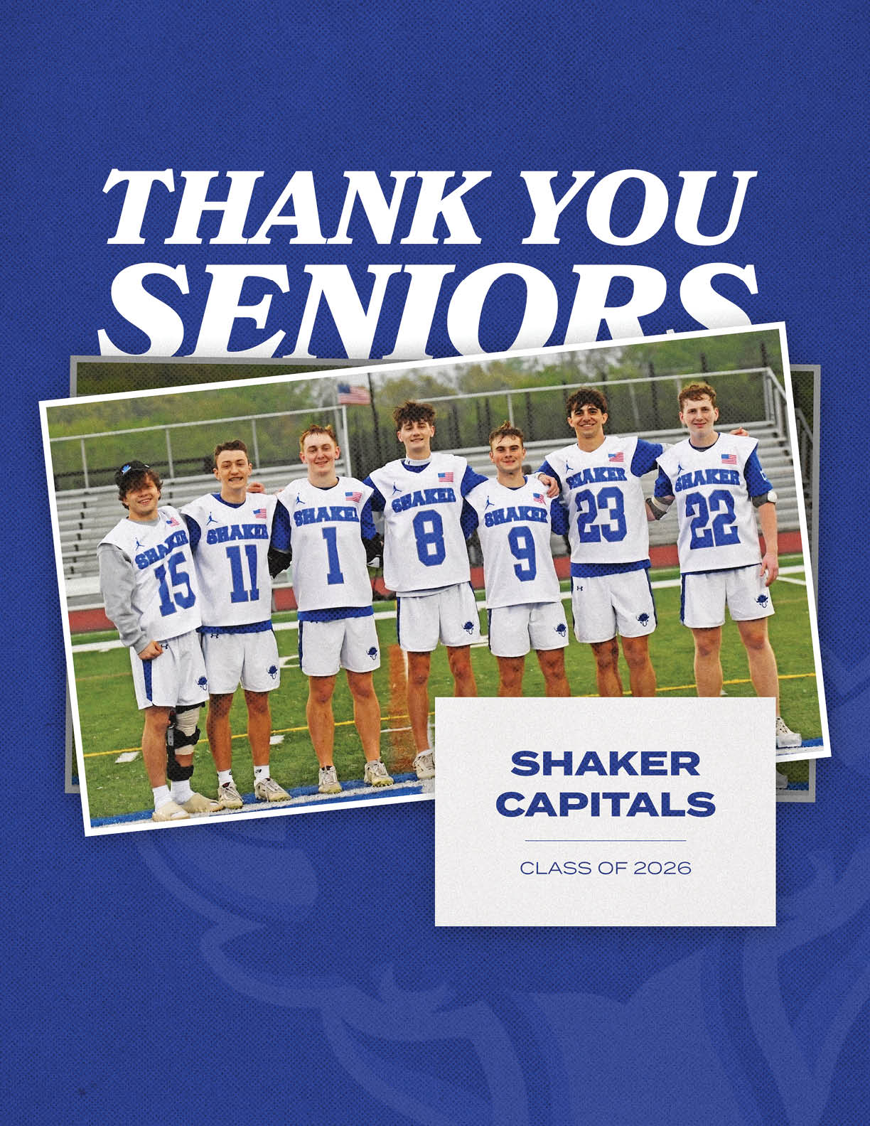 Seven adults wearing matching sports uniforms stand side by side on a field with text above them saying thank you seniors and a label below reading Shaker Capitals class of 2026. Description generated by AI
