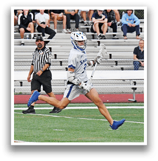 A man is running on a field while holding a lacrosse stick. AI generated content