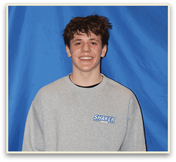 A young man wearing a grey sweatshirt with a blue background. AI generated content