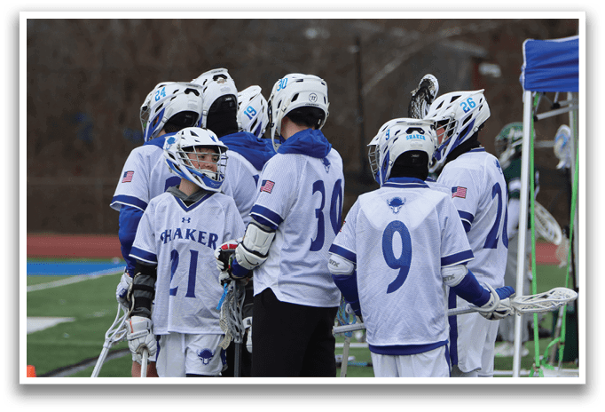 A group of young men wearing hockey uniforms and helmets are standing on a field. AI generated content