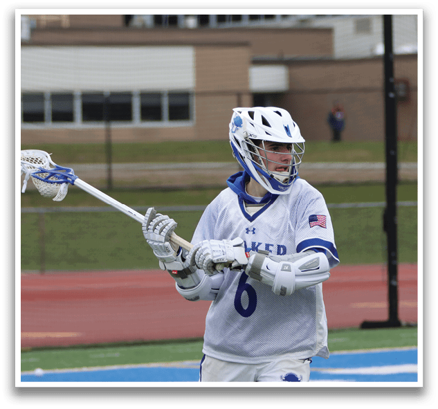 A man in a white jersey holding a lacrosse stick. AI generated content