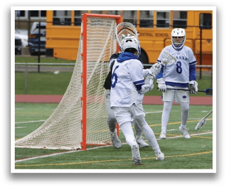 A group of people playing lacrosse on a field. AI generated content