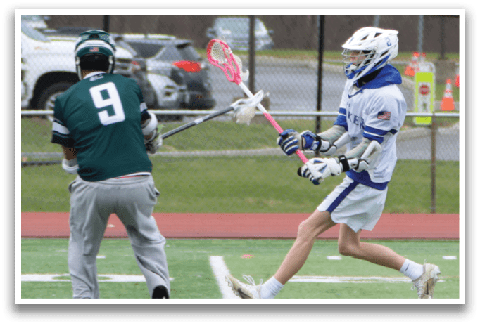 Two people playing a game of lacrosse on a field. AI generated content