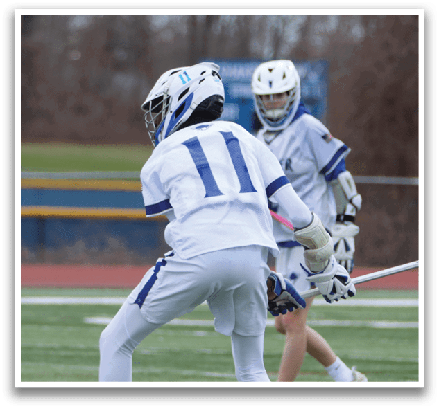 Three people playing lacrosse on a field. AI generated content