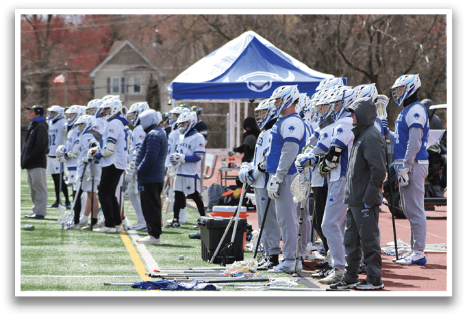 A group of hockey players are standing on a field, holding their sticks. AI generated content
