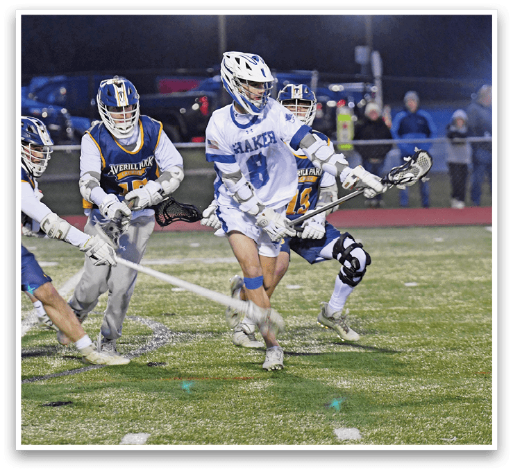 A group of young men playing a game of lacrosse on a field. AI generated content