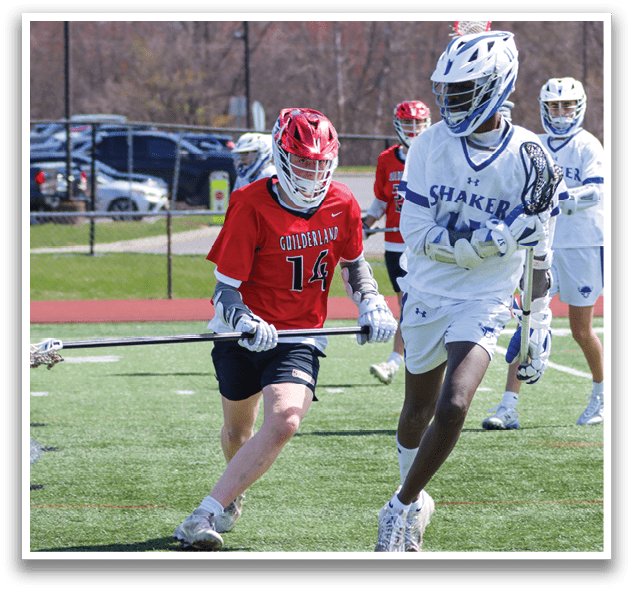 A group of people playing a game of lacrosse on a field. AI generated content