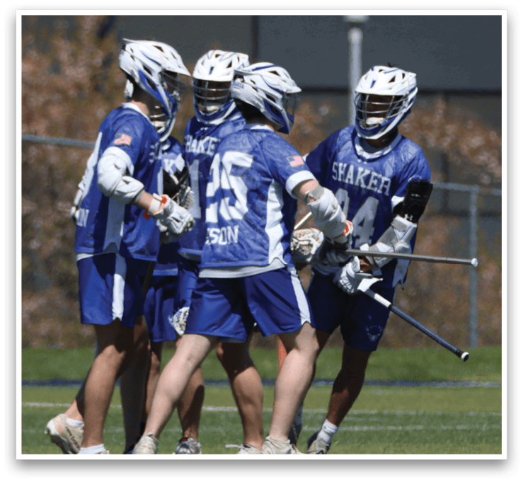 A group of men wearing blue and white uniforms are standing on a field, talking to each other. AI generated content