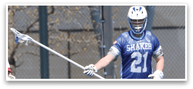 A man in a blue and white uniform holding a lacrosse stick. AI generated content