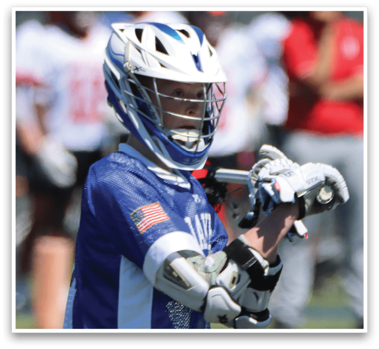 A young boy wearing a blue and white baseball uniform is holding a bat. AI generated content