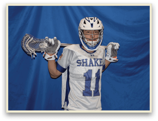 A man wearing a white and blue jersey holds a lacrosse stick. AI generated content
