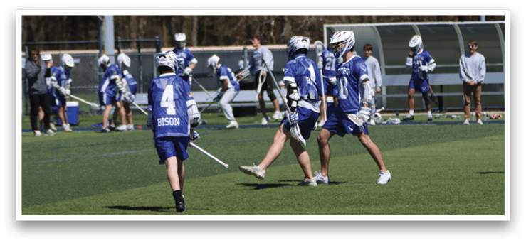 A group of people playing a game of lacrosse on a field. AI generated content
