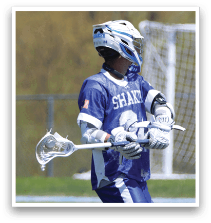 A man wearing a blue and white uniform is holding a lacrosse stick. AI generated content