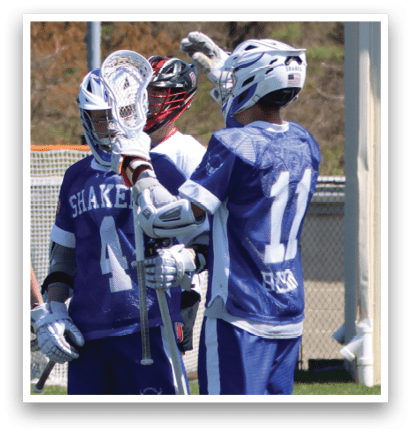 Two men wearing blue and white uniforms are standing on a field, talking to each other. AI generated content