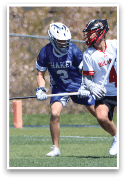 Two men playing lacrosse on a field. AI generated content