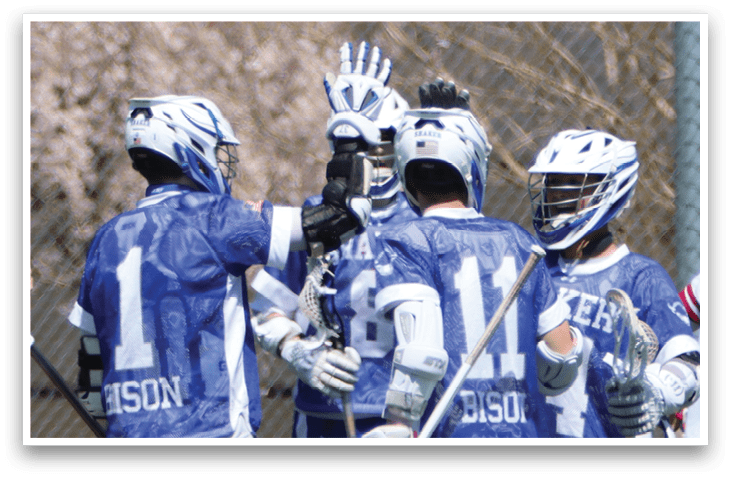 A group of men wearing blue jerseys are playing a game of lacrosse. They are holding their sticks and celebrating a goal. AI generated content