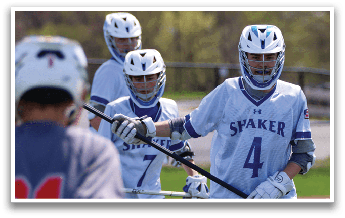 A group of young men playing a game of lacrosse. One player is holding a stick and preparing to shoot the ball. AI generated content